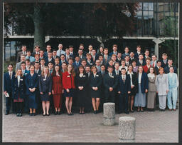 Group shot of students on campus labelled "Computer Systems May 96"