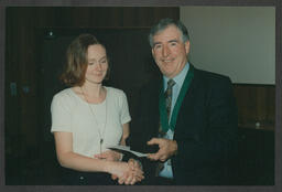 Award ceremony and shots of individual giving presentation/talk labelled "Irish universities chemistry convention June 1996 Tim Smyth"