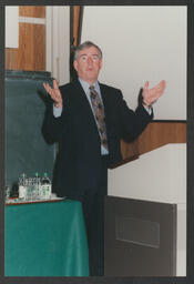 Award ceremony and shots of individual giving presentation/talk labelled "Irish universities chemistry convention June 1996 Tim Smyth"