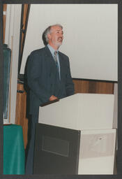 Award ceremony and shots of individual giving presentation/talk labelled "Irish universities chemistry convention June 1996 Tim Smyth"