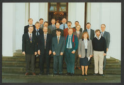 Graduation shot, group shot in front of Plassey House, various unidentified objects