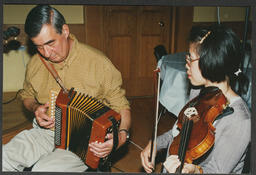 Musicians/students playing a range of musical instruments attached to Irish World Music Centre (IWMC) and Languages and Cultural Studies (LCS)