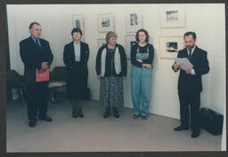 A speaker addressing attendees at the French Ambassador Exhibition Opening 