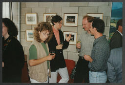 Humanities Presentation, Marc Serge Rivière book launch, "The Governor's Noble Guest," Group Portraits taken outside Plassey House, a man and a woman in Plassey House, two men looking at a book titled "American Institute for Foreign Study 1999-2000"