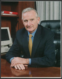 Noel Whelan in his office in relation to the 'College of Business Brochure'