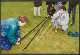 Shots of students conducting an experiment, [Physical disability aids for young children?],Various unidentified objects labelled "Sarah Cox M + AE" and "Mark Davies M + AE"