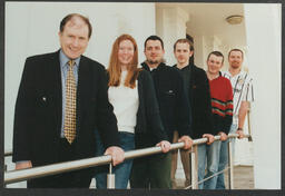 Professor Tim McGloughlin with students in front of Plassey House at the University of Limerick