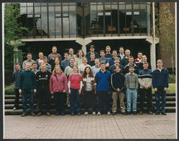 Various group photos on campus including graduations - some labelled Tom Geary, Law and European Studies, Tom Kennedy, humanities, business risk and insurance, insurance and euro studies, Garvin Barry & Anne Mary Ryan, D Dineen, M + AE 4th year 1999 etc