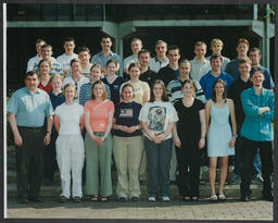 Various group photos on campus including graduations - some labelled Tom Geary, Law and European Studies, Tom Kennedy, humanities, business risk and insurance, insurance and euro studies, Garvin Barry & Anne Mary Ryan, D Dineen, M + AE 4th year 1999 etc