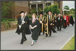 An Academic Procession Headed by Mace Bearer Walter Alfred at a Conferring Ceremony at the University of Limerick