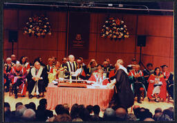 President Roger G.H. Downer Performing the Degree Conferral and Handing a Graduate their Diploma at a Conferring Ceremony at the University of Limerick