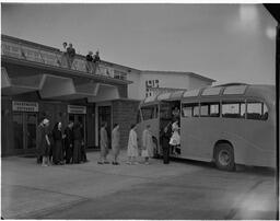 Bus tour loading on ramp