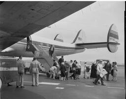 Passengers disembarking on ramp